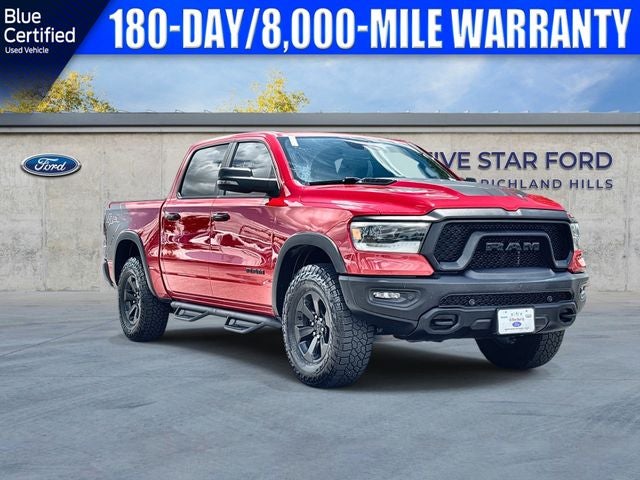 2023 RAM 1500 Rebel in Flame Red Clearcoat — front three-quarter view