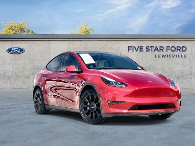 2023 Tesla Model Y Long Range in Red Multi-Coat — front three-quarter view