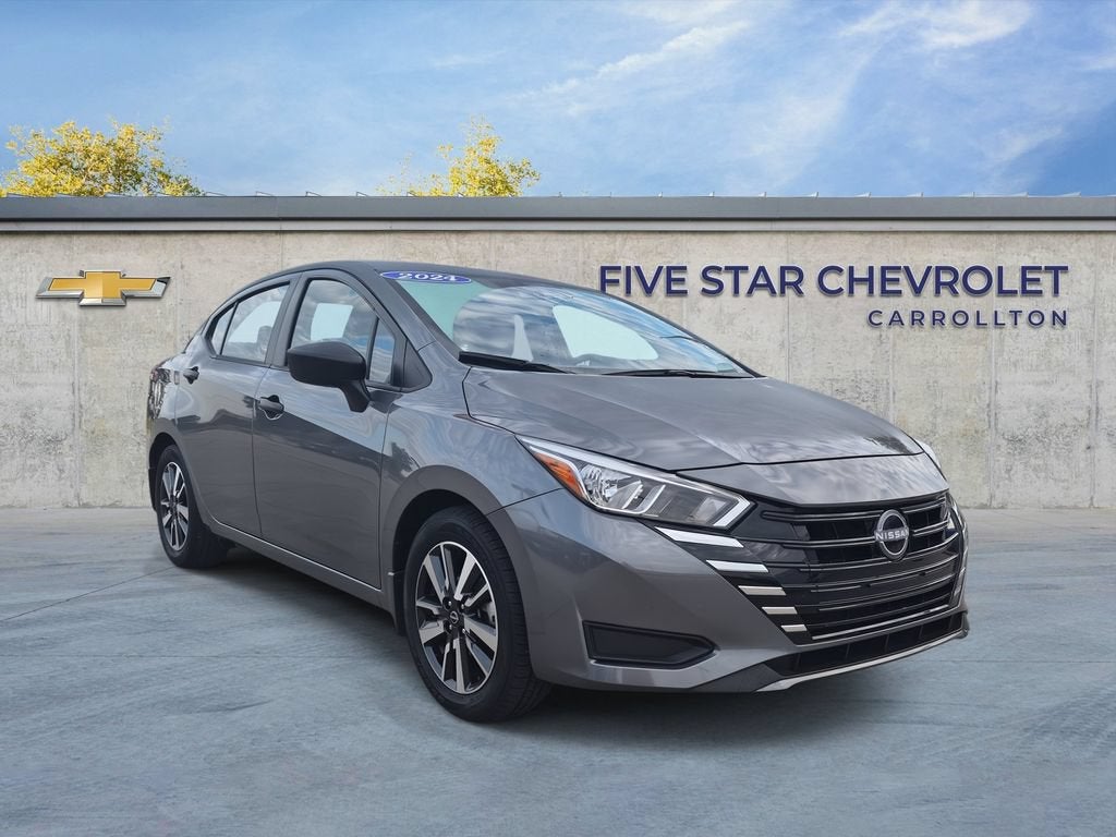 2024 Nissan Versa S in Gray — front three-quarter view