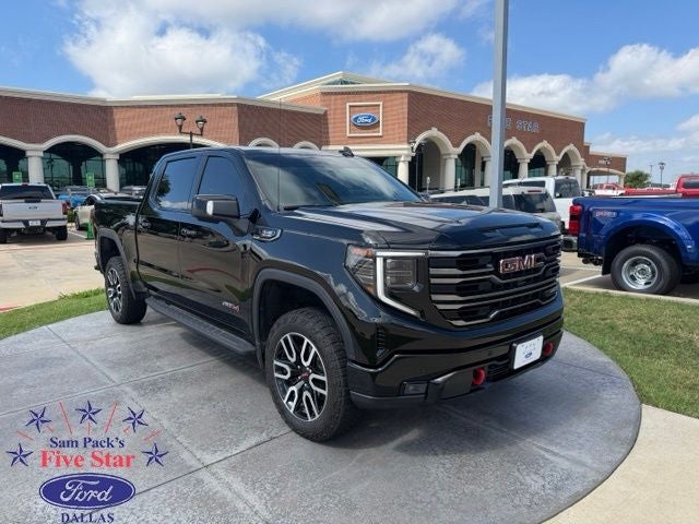 2025 GMC Sierra 1500 AT4 in Onyx Black — front three-quarter view